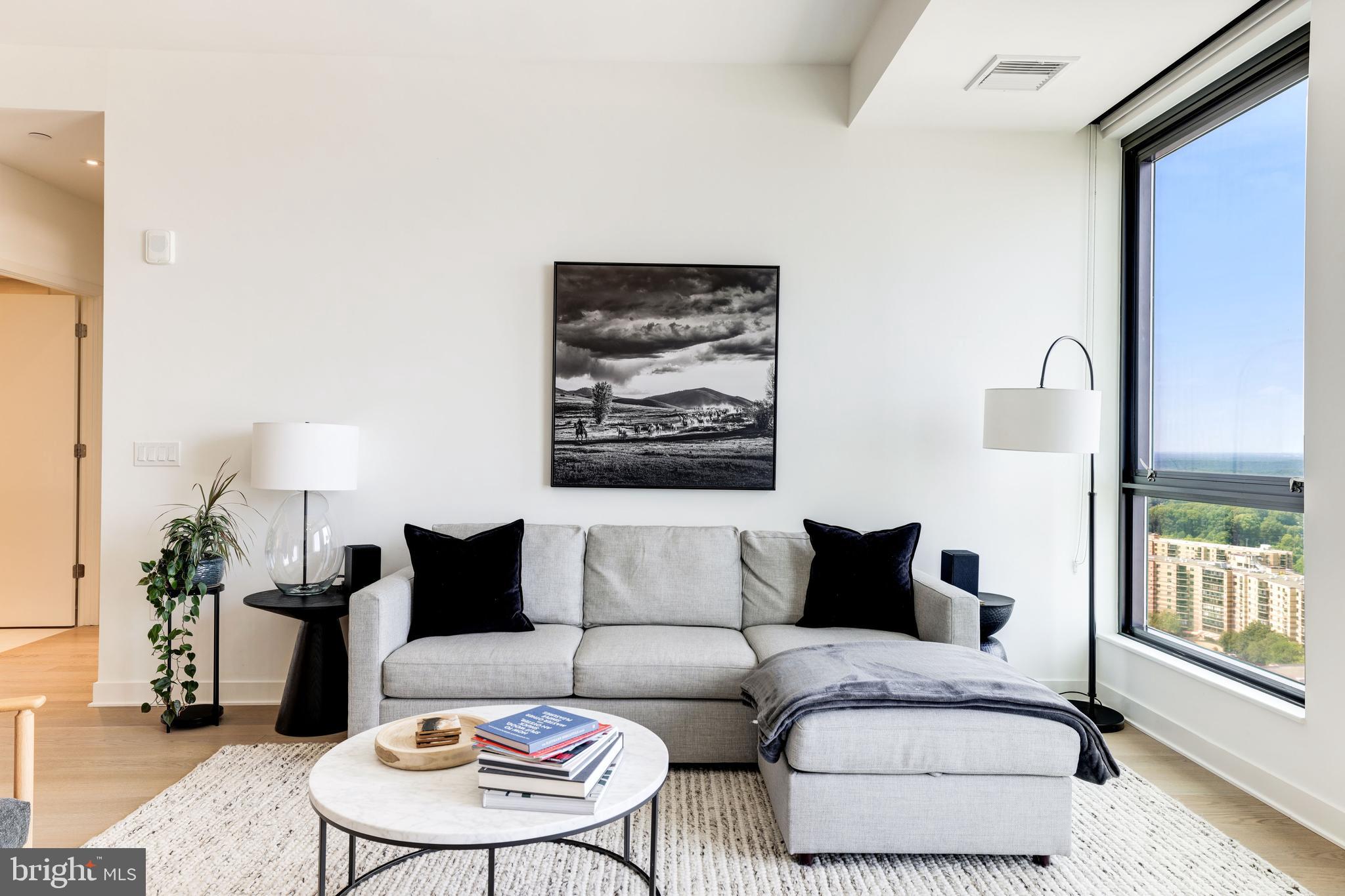 1650 Silver Hill Drive, Unit 23091 McLean, VA 22102 - Photo 8 of 86 a living room with furniture and a large window