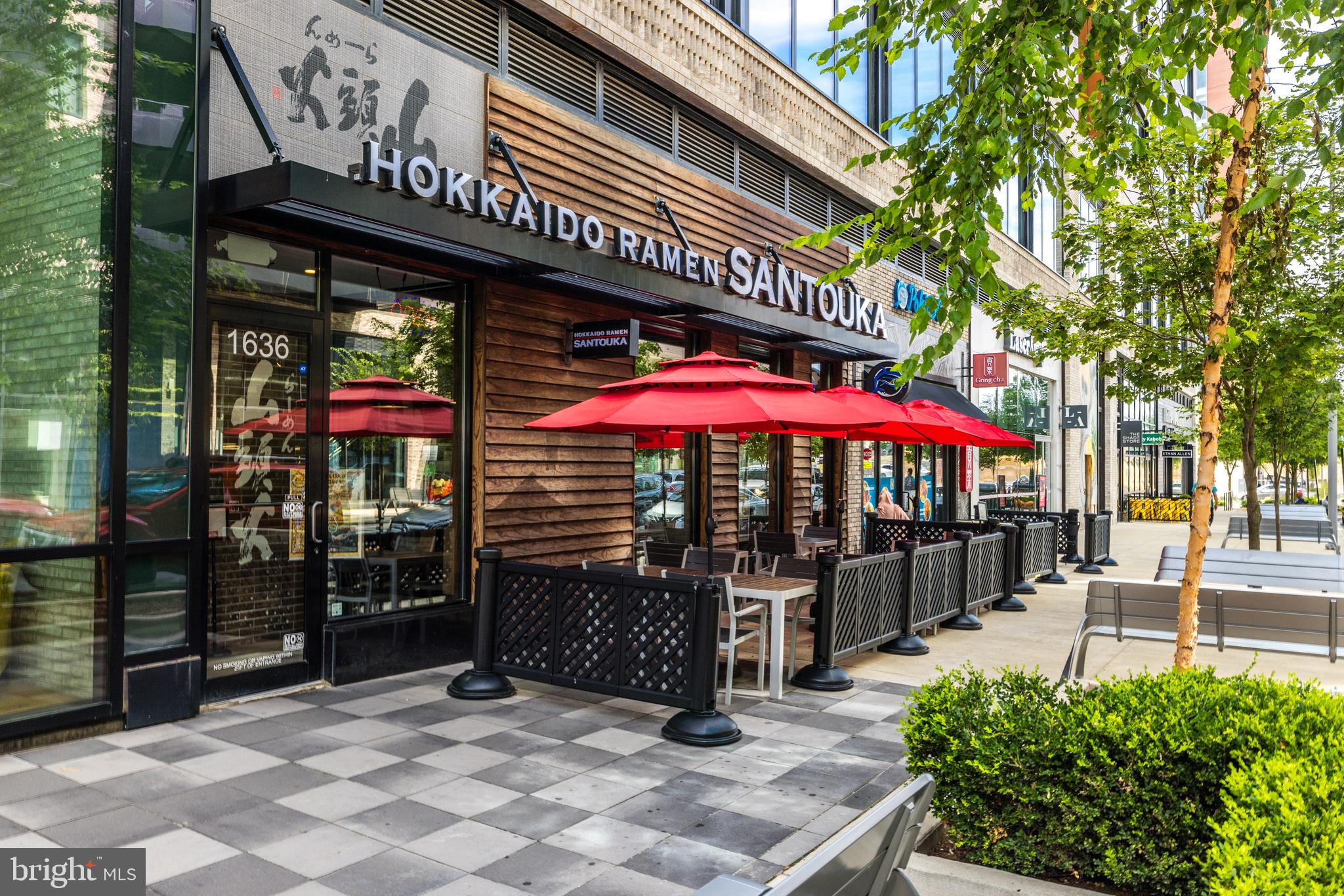 1650 Silver Hill Drive, Unit 23091 McLean, VA 22102 - Photo 85 of 86 a view of a cafe with a couple of people seating