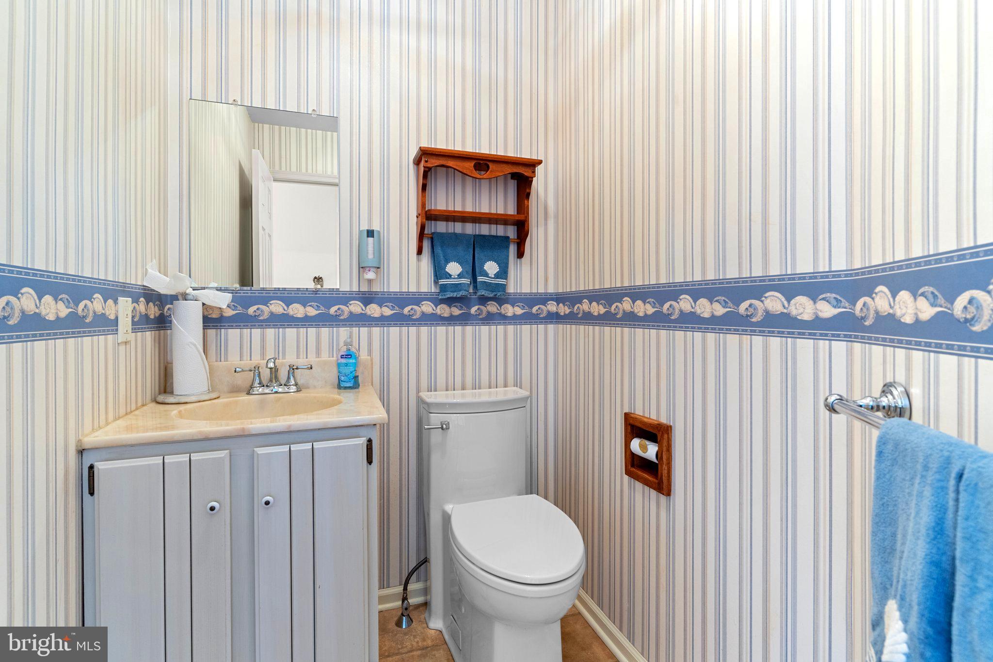 110 Teal Drive Doylestown, PA 18901 - Photo 13 of 30 a bathroom with a toilet a sink and mirror