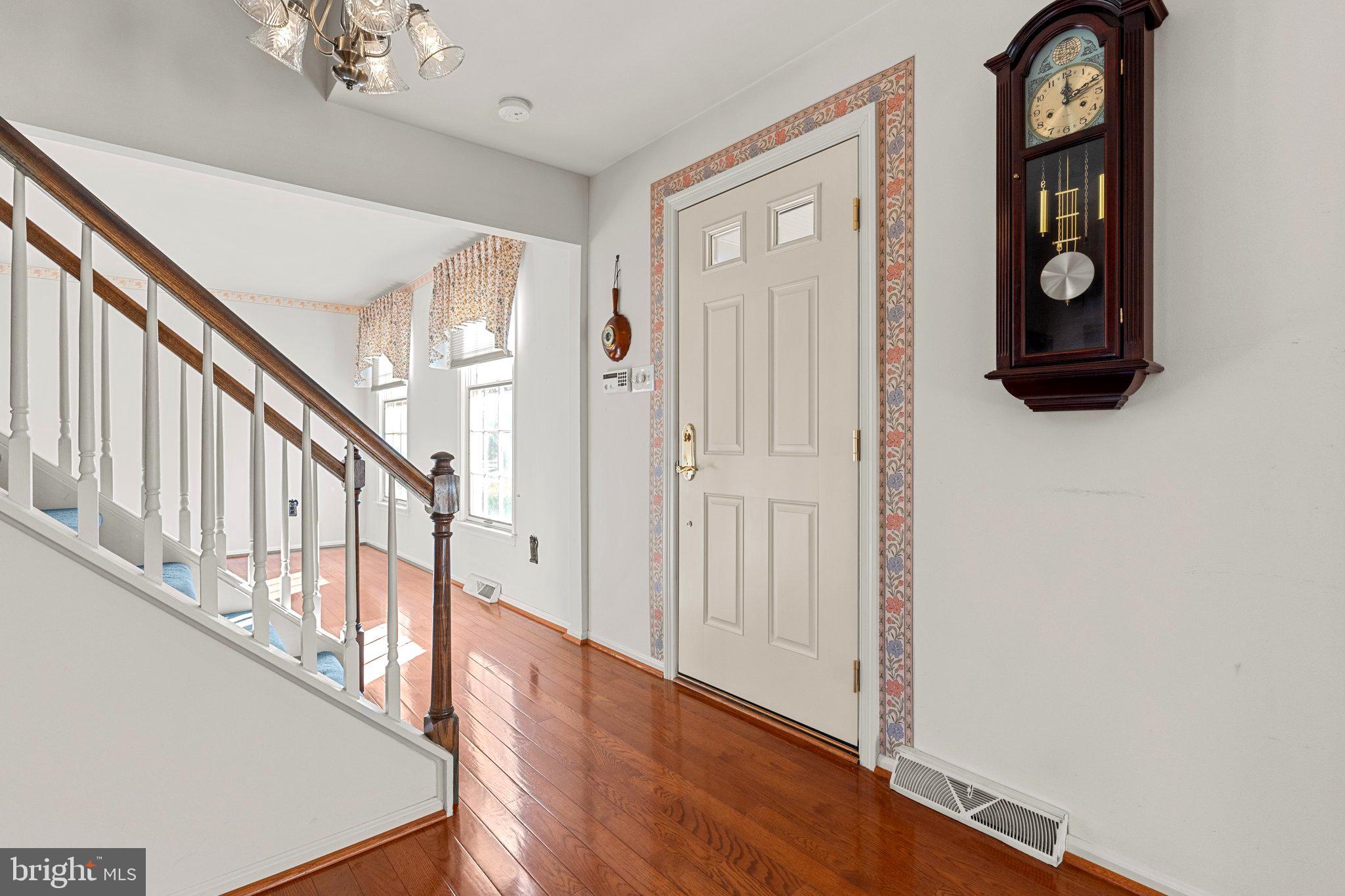 110 Teal Drive Doylestown, PA 18901 - Photo 3 of 30 a view of entryway with wooden floor and stairs