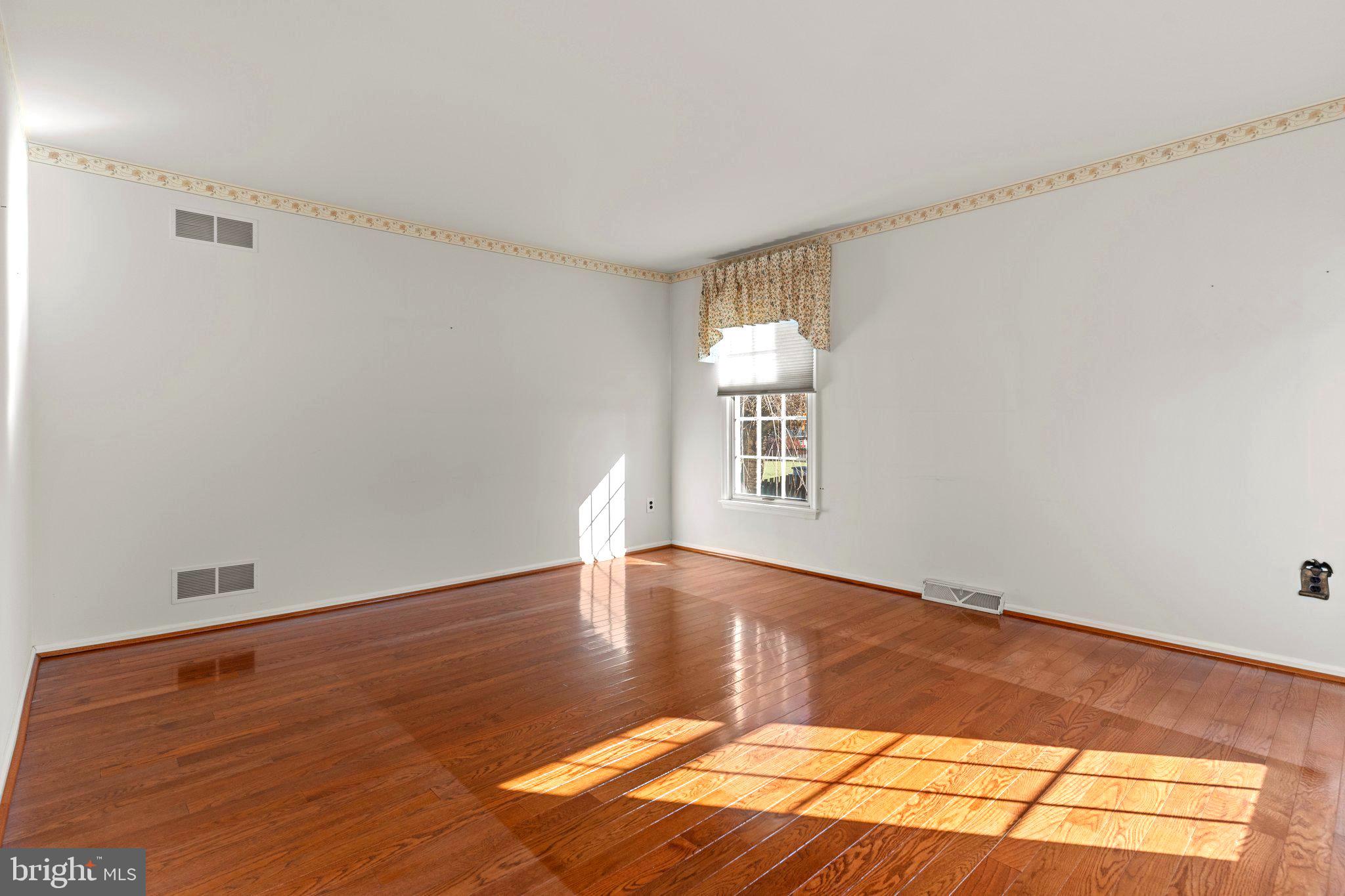 110 Teal Drive Doylestown, PA 18901 - Photo 5 of 30 a view of a livingroom with wooden floor and a window
