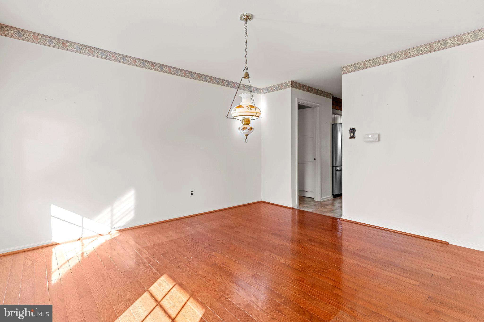 110 Teal Drive Doylestown, PA 18901 - Photo 7 of 30 a view of a room with wooden floor and white walls