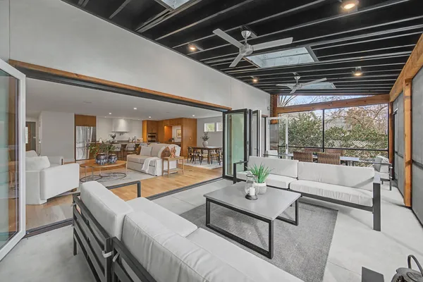 a living room with furniture and a table