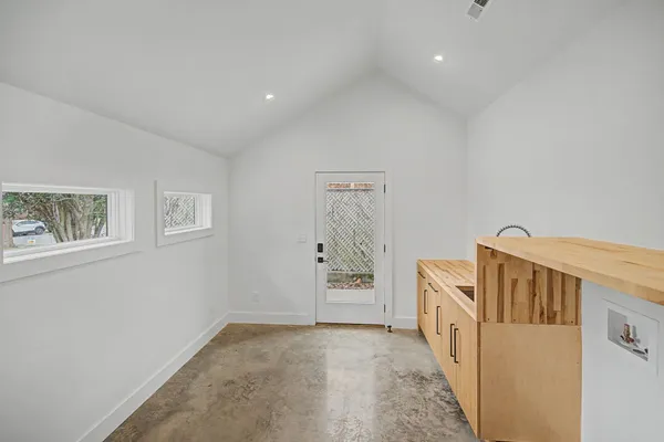 a view of a hallway with entryway