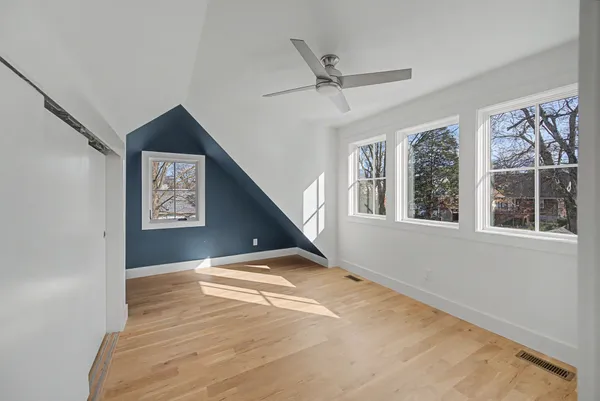 a view of a hallway with a window