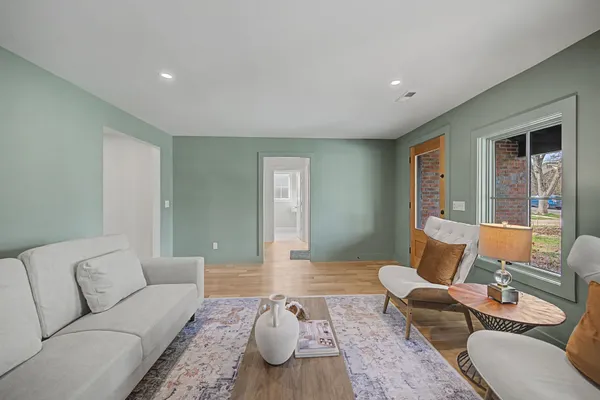 a living room with furniture and a couch