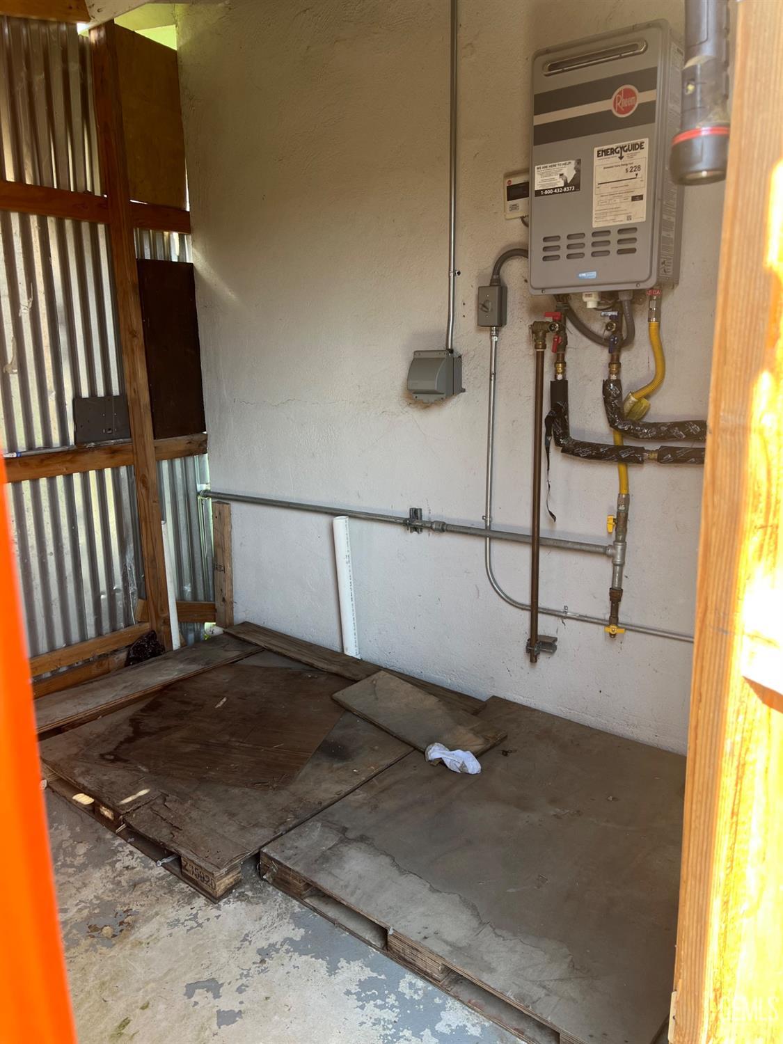 Undisclosed Address Bakersfield, CA 93304 - Photo 16 of 22 a view of a room with wooden floor