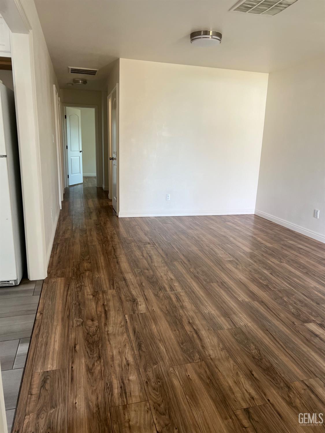 Undisclosed Address Bakersfield, CA 93304 - Photo 7 of 22 wooden floor in a gallery