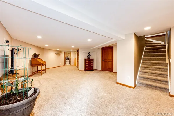 a room with furniture and a flat screen tv