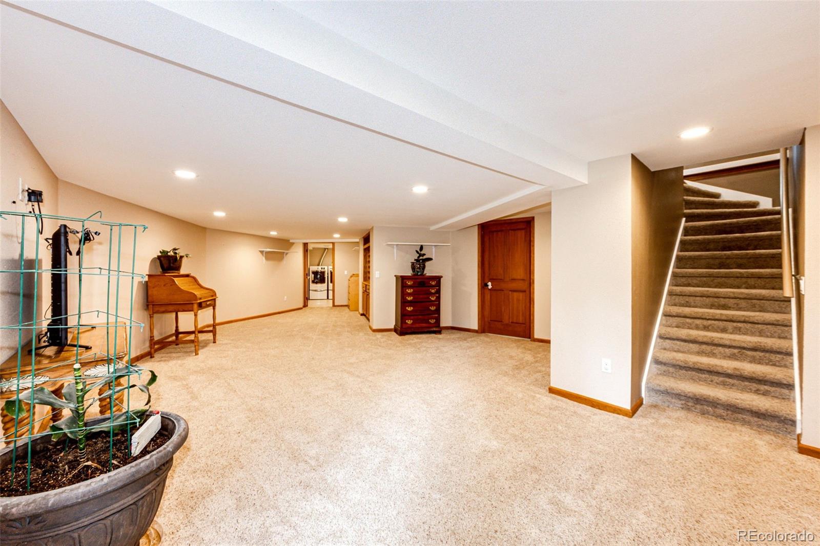 8788 East Tanglewood Road Franktown, CO 80116 - Photo 20 of 48 a view of a room with gym equipment