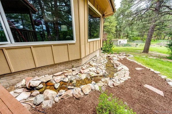 a view of a wooden deck with a patio
