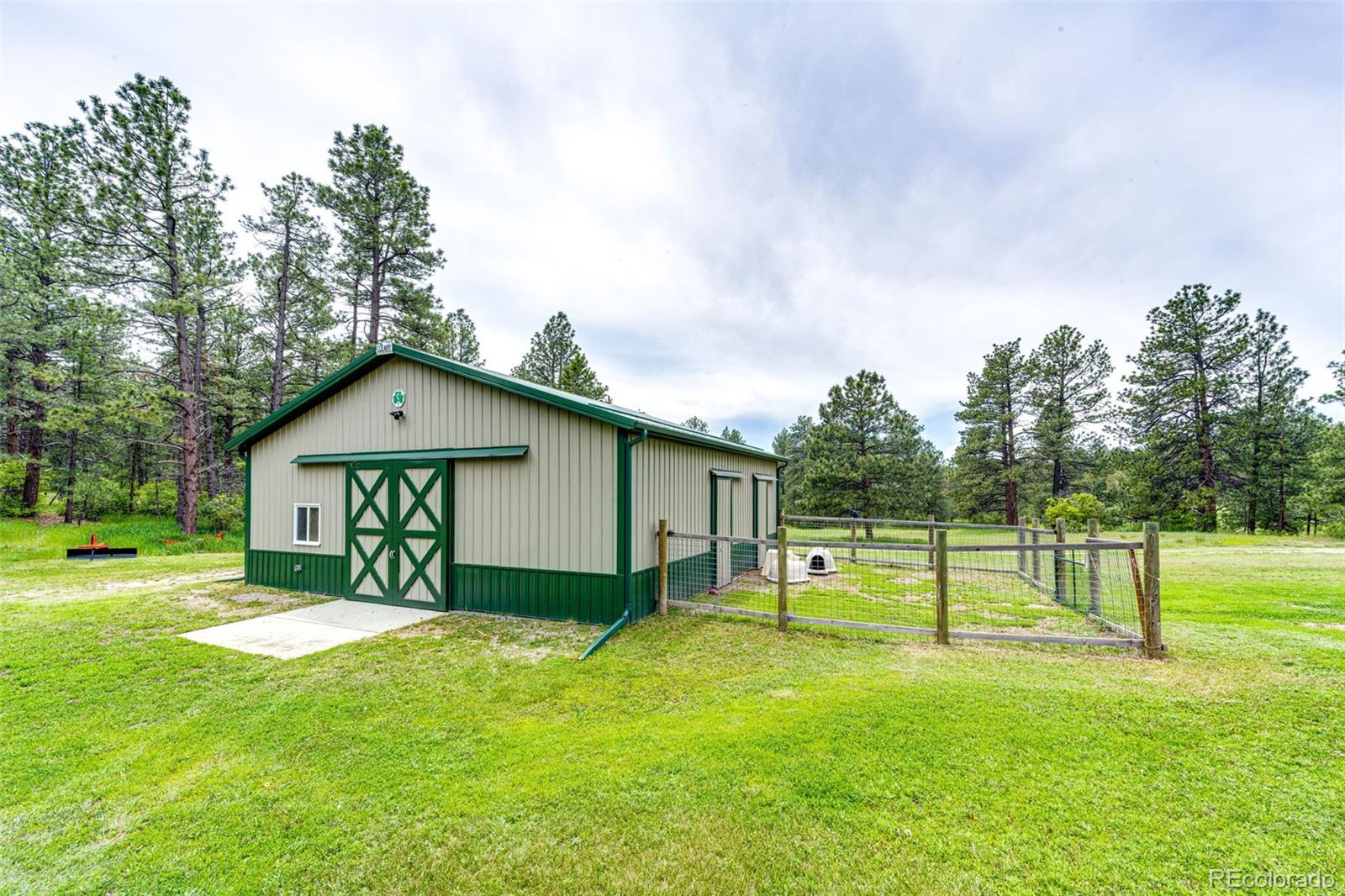 8788 East Tanglewood Road Franktown, CO 80116 - Photo 39 of 48 a view of outdoor space yard and deck