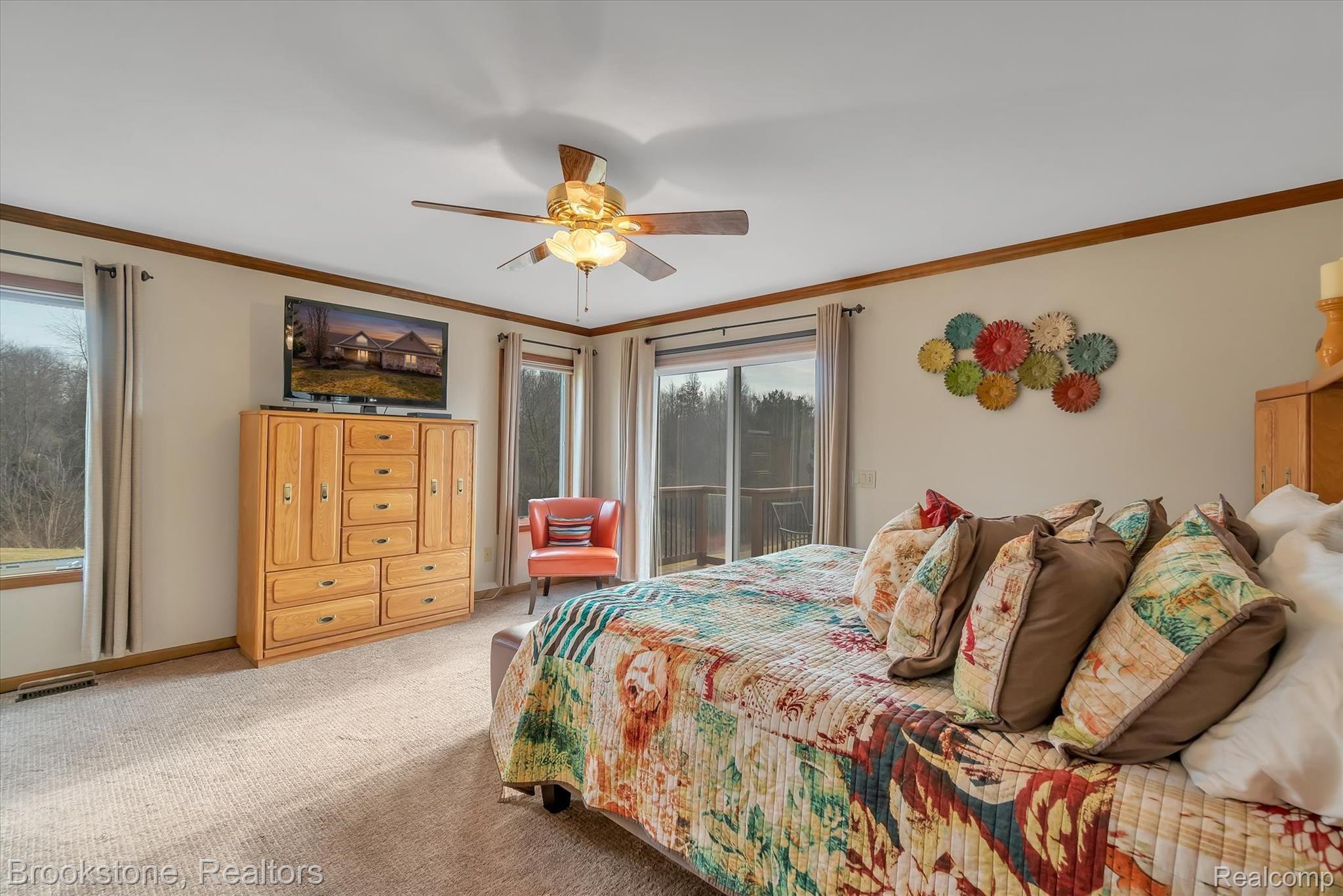 7474 Bennett Lake Road Fenton, MI 48430 - Photo 12 of 40 Master with door wall to their deck side!