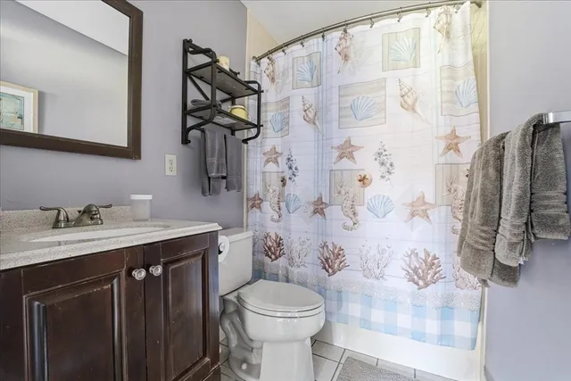 a bedroom with bed and window