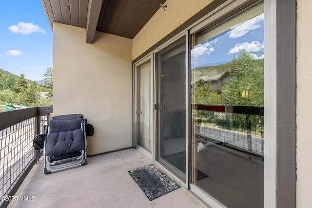 a room with furniture and a window