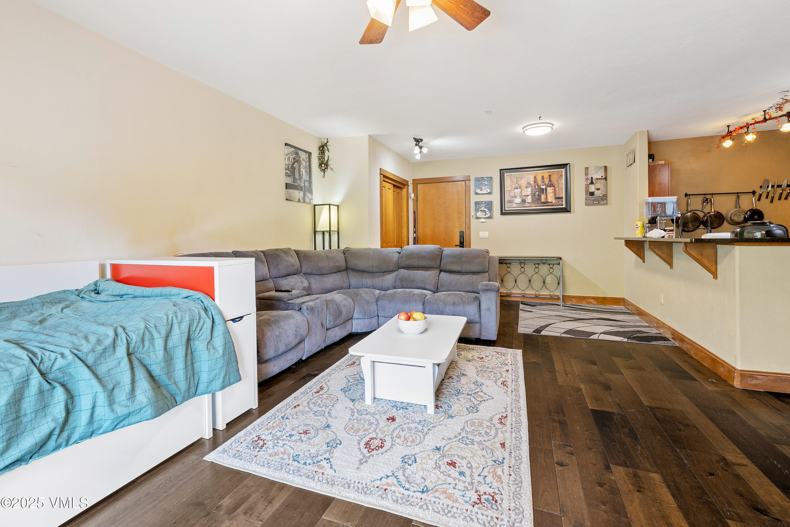 22787 Highway 6, Unit 207 Dillon, CO 80435 - Photo 6 of 44 a living room with furniture and a flat screen tv