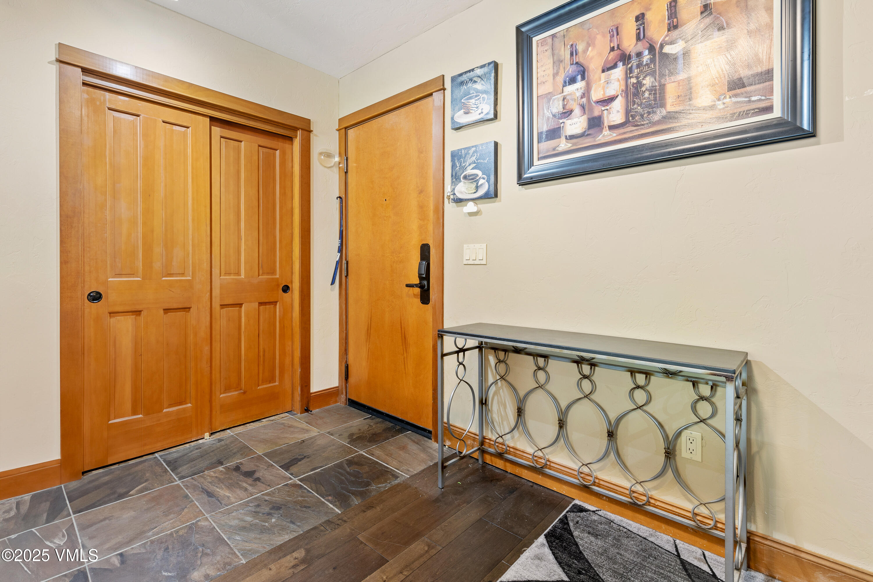22787 Highway 6, Unit 207 Dillon, CO 80435 - Photo 9 of 44 a view of an entryway with wooden floor