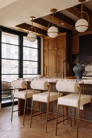 a view of a dining room with furniture and window