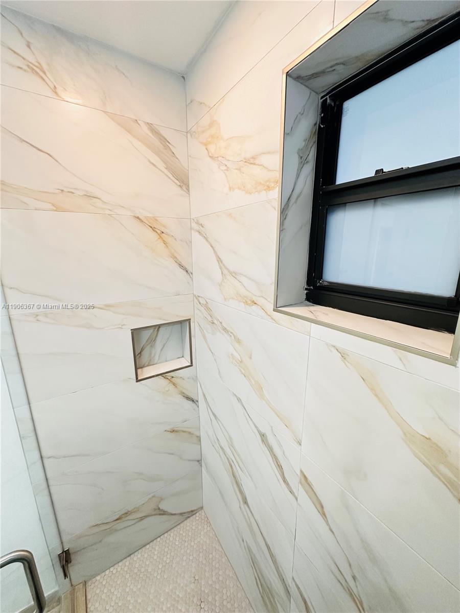 5991 Southwest 76th Street, Unit C4 South Miami, FL 33143 - Photo 18 of 19 a view of a microwave