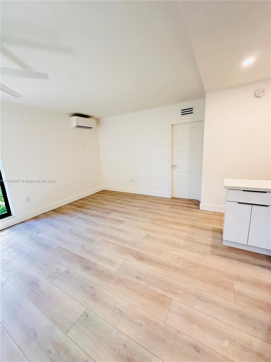 5991 Southwest 76th Street, Unit C4 South Miami, FL 33143 - Photo 5 of 19 a view of an empty room