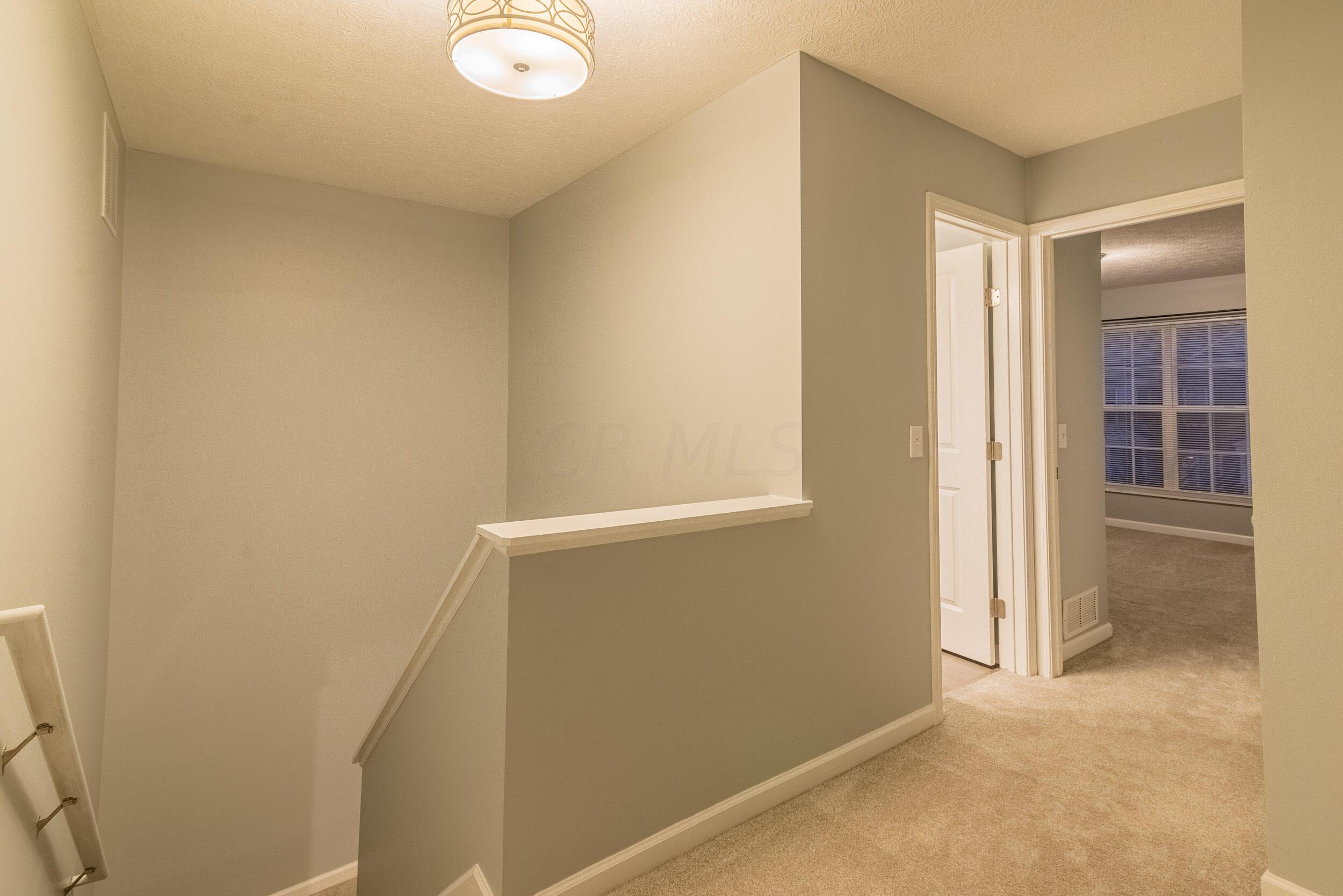 6196 Joes Hopper Road, Unit 75619 Columbus, OH 43230 - Photo 15 of 23 Upstairs Hallway