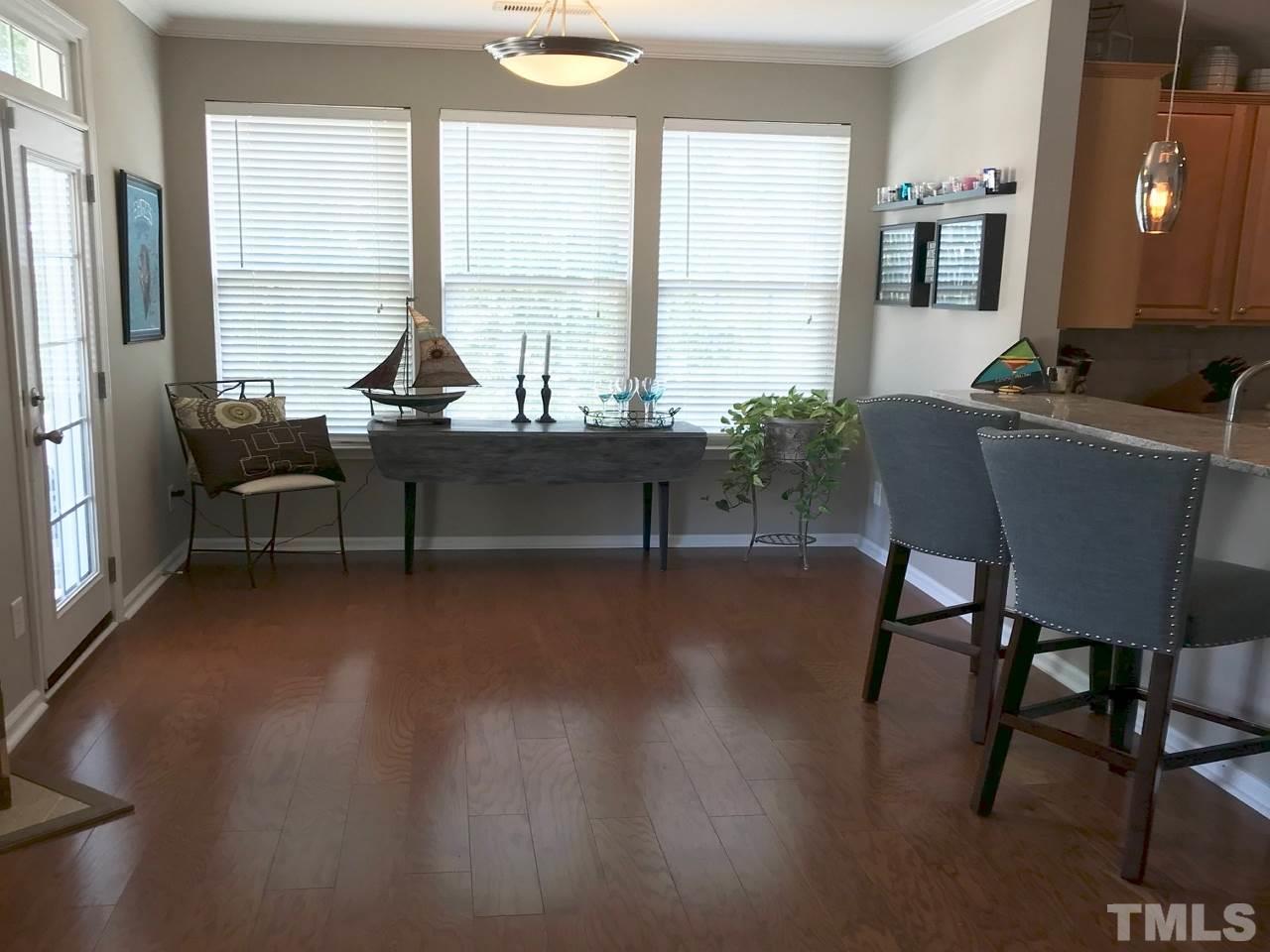 5402 Silver Moon Lane Raleigh, NC 27606 - Photo 8 of 25 Area could be used as a breakfast area or sun room, whatever fits your lifestyle!