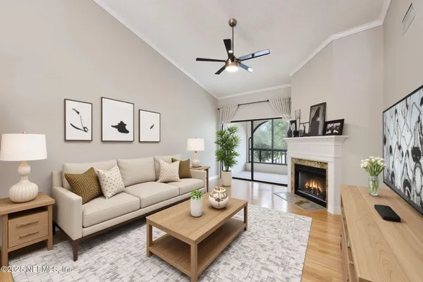 a living room with furniture and a fireplace