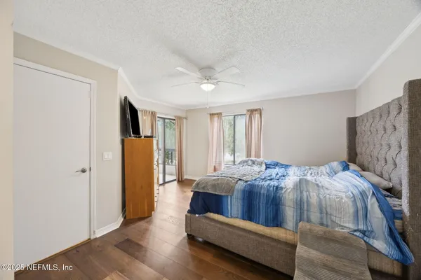 a bed room with a bed and a window
