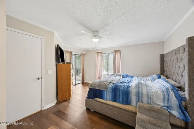 a bed room with a bed and a window