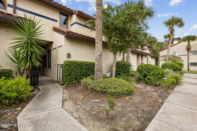 a view of a house with a street