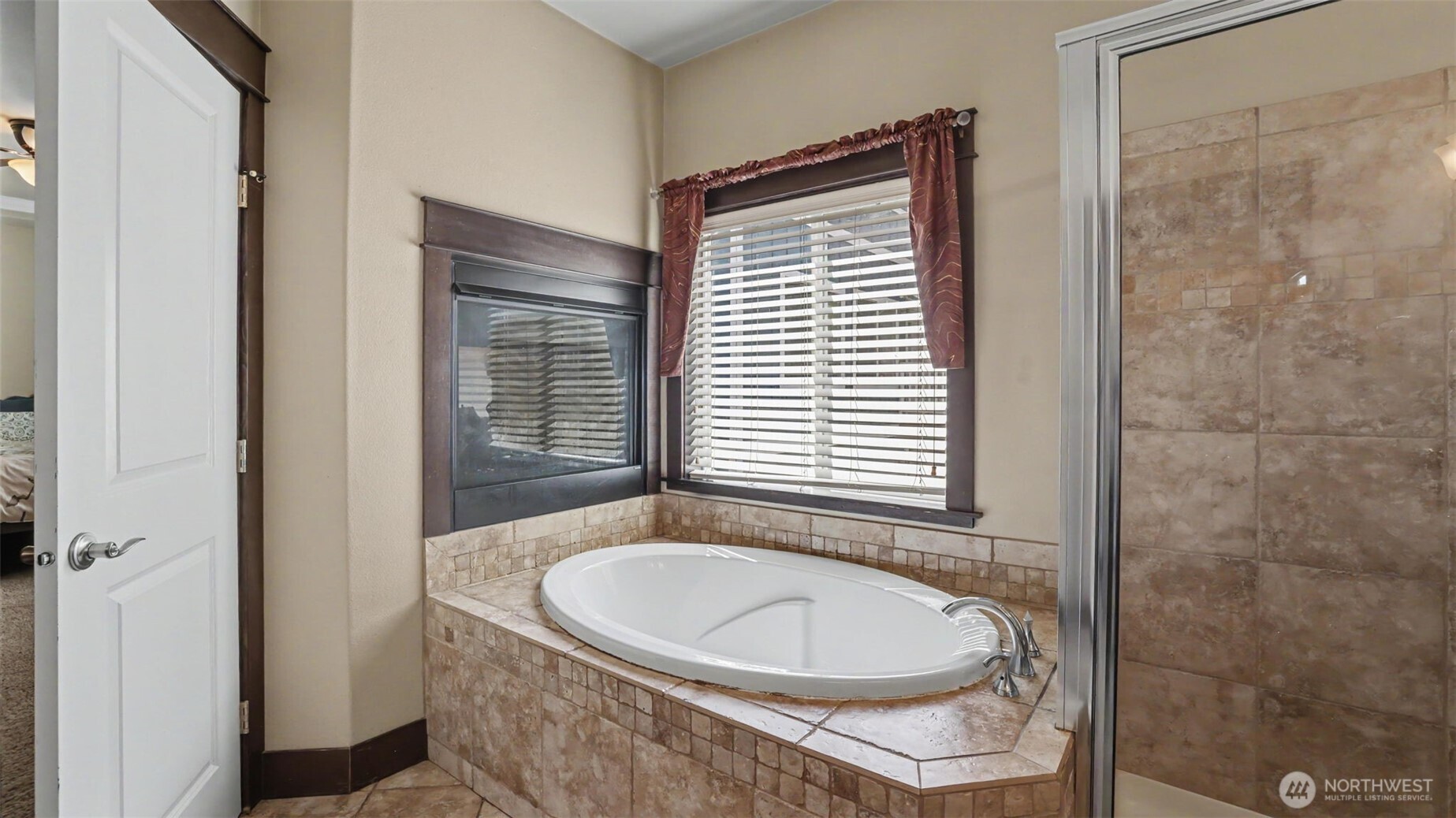 1357 Elma Place Northeast Renton, WA 98059 - Photo 19 of 40 a bathroom with a sink and a bathtub