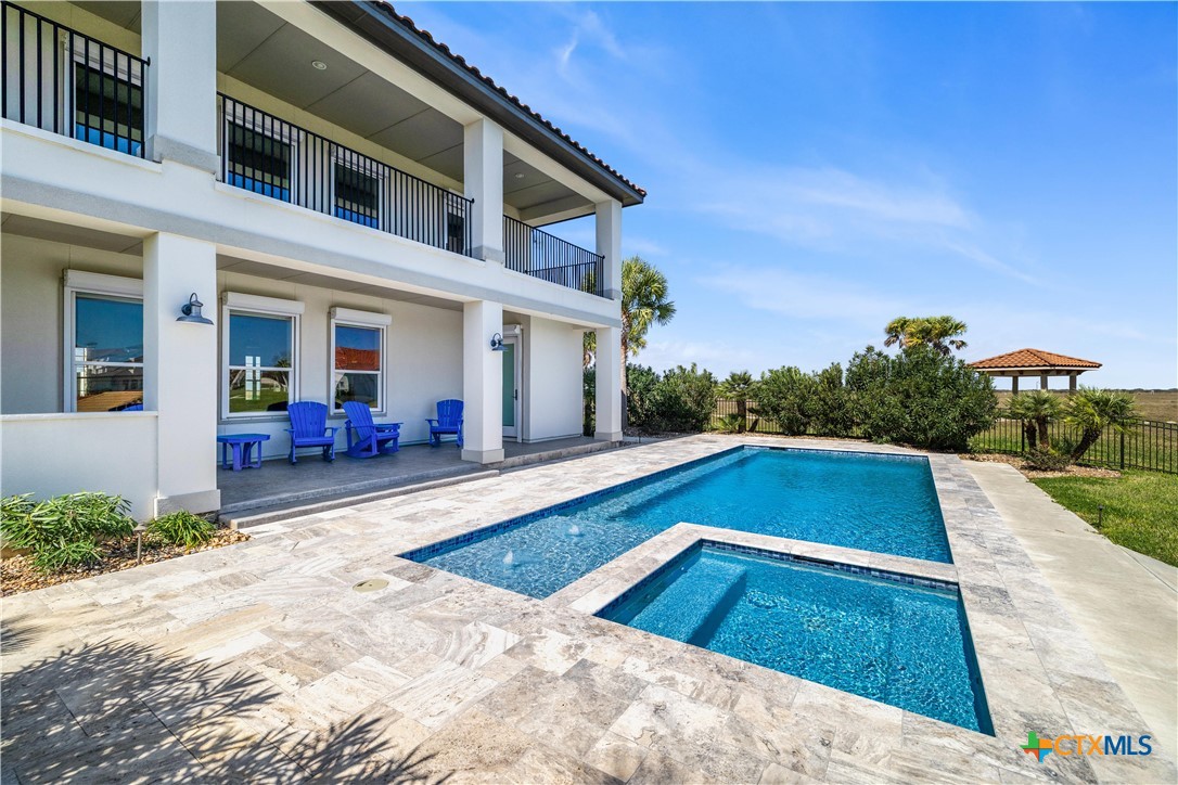 559 West Lago Loop Road Port O'Connor, TX 77982 - Photo 40 of 44 a view of swimming pool with outdoor seating