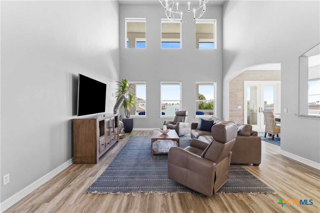 559 West Lago Loop Road Port O'Connor, TX 77982 - Photo 5 of 44 a living room with furniture and a flat screen tv