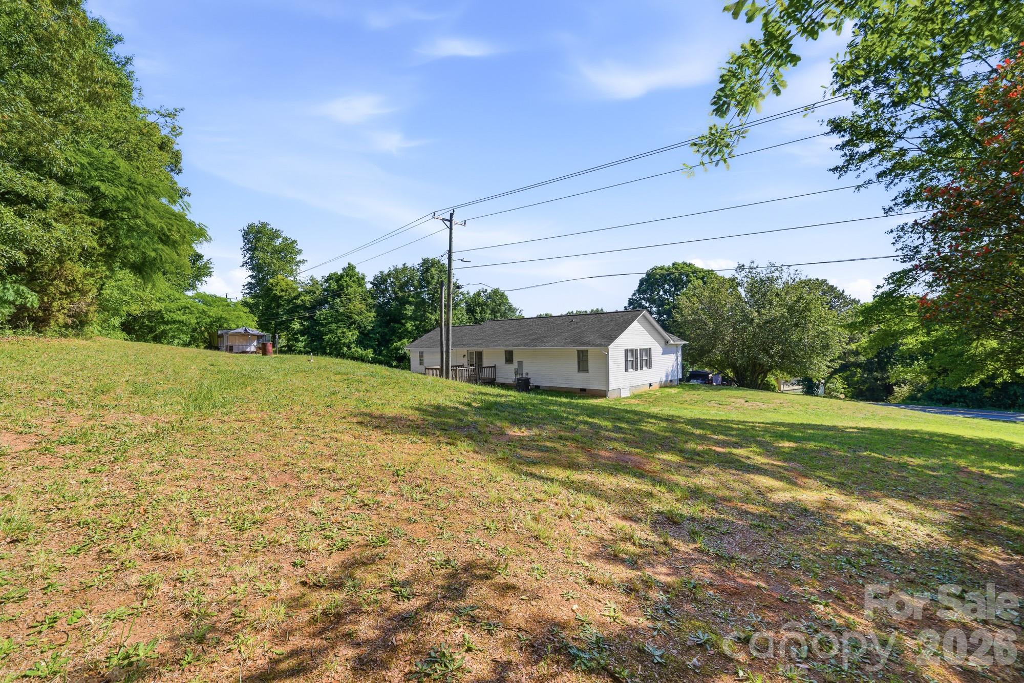 248 Jack McKinney Road Forest City, NC 28043 - Photo 6 of 29 a front view of a house with a yard