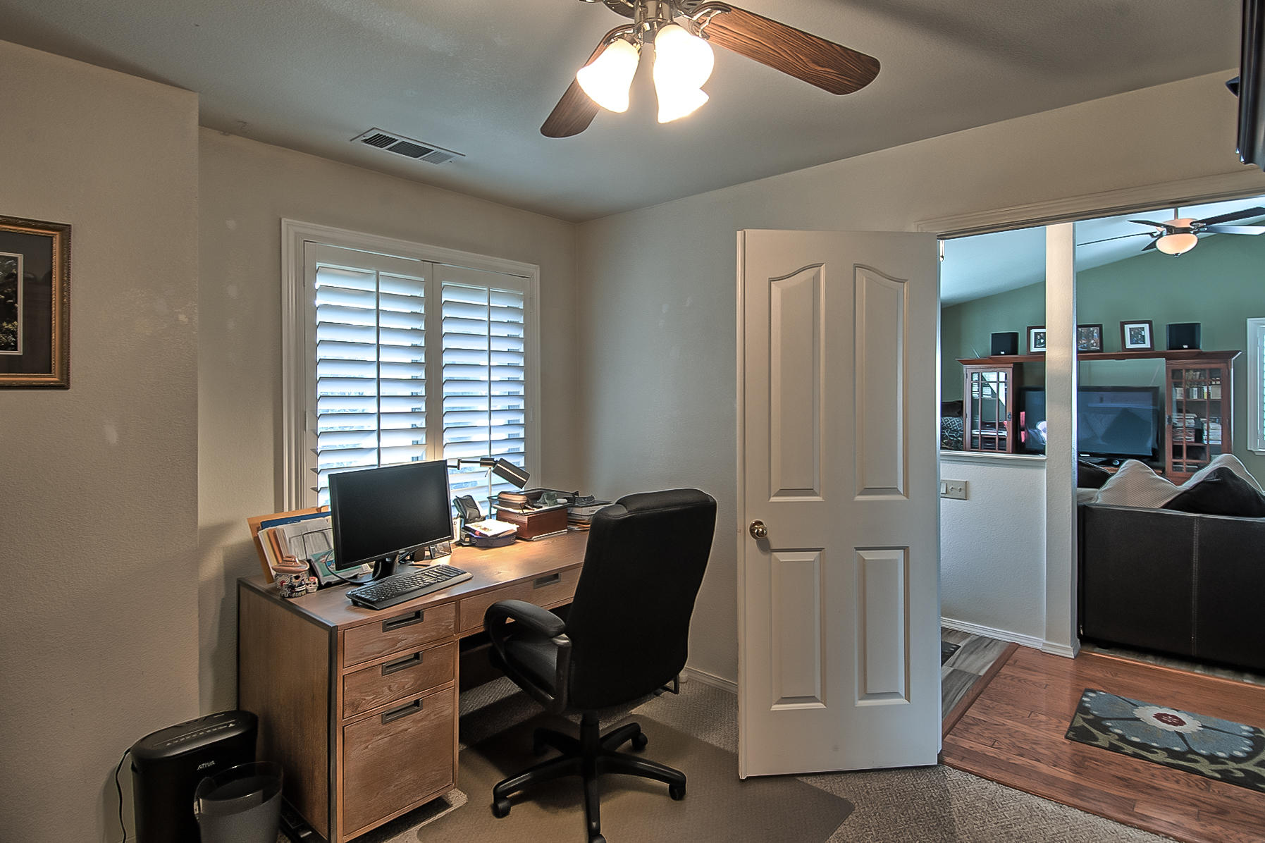 1566 Lavender Way Redding, CA 96003 - Photo 15 of 36 a view of a workspace with furniture and a window
