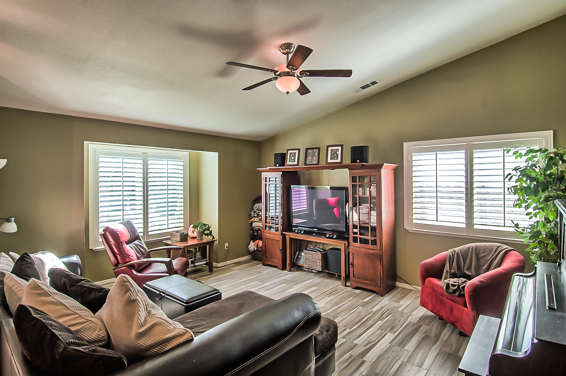 1566 Lavender Way Redding, CA 96003 - Photo 5 of 36 a living room with furniture and a flat screen tv