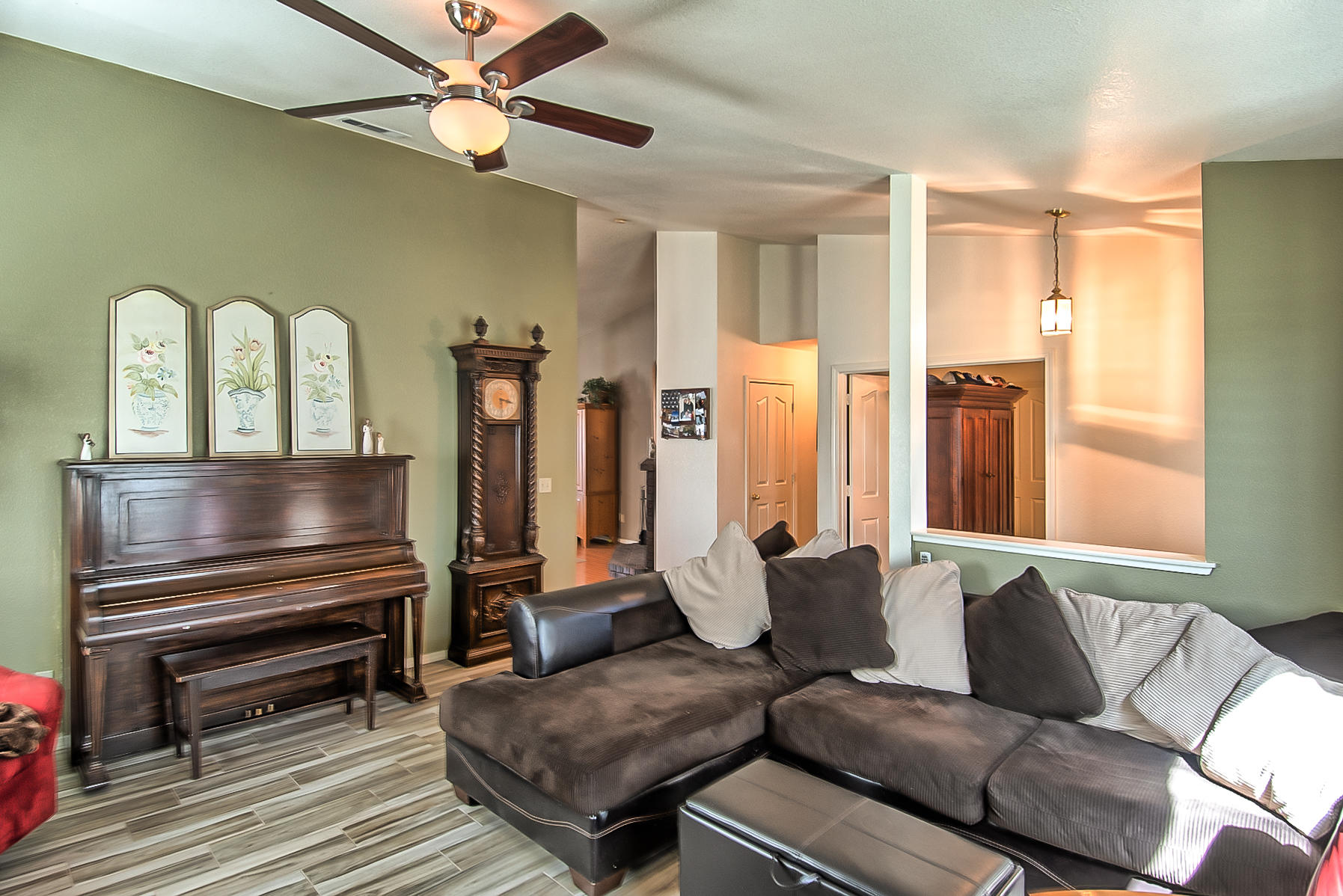 1566 Lavender Way Redding, CA 96003 - Photo 6 of 36 a living room with furniture and wooden floor