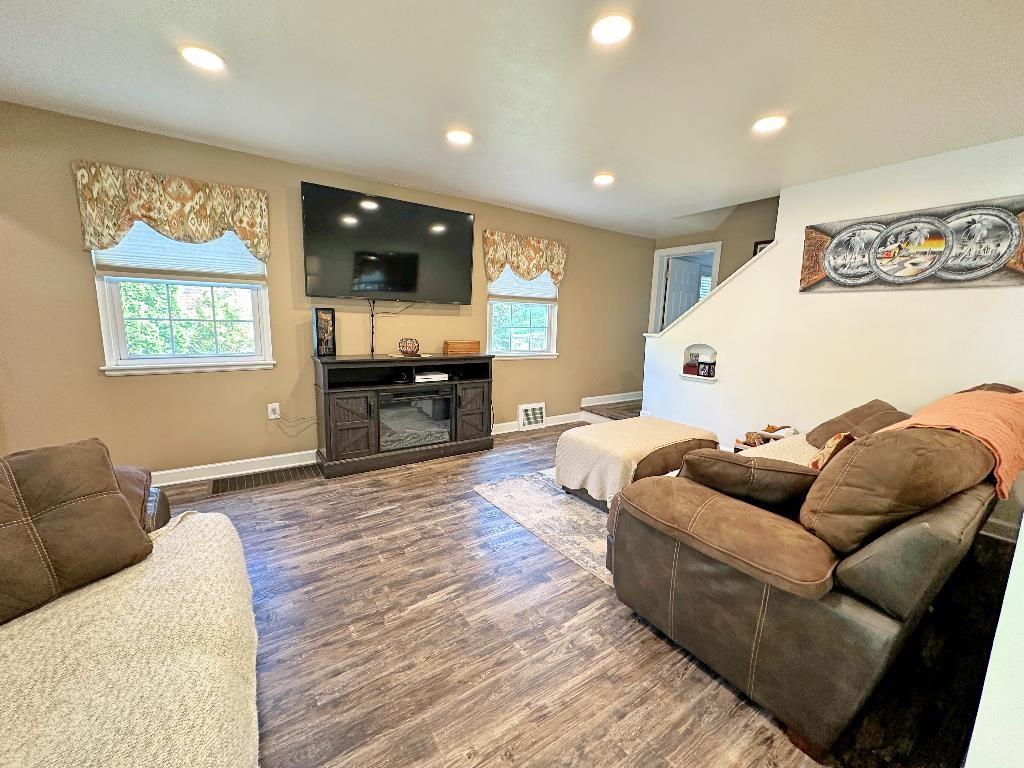 318 Vanadium Road Pittsburgh, PA 15243 - Photo 6 of 30 a living room with furniture and a flat screen tv