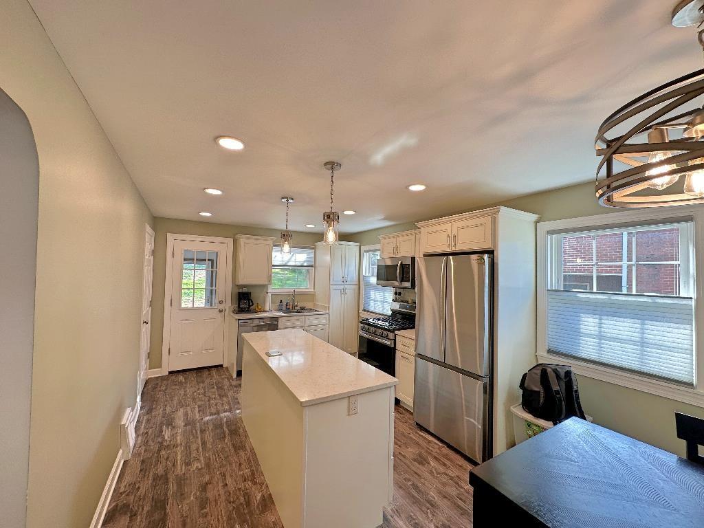318 Vanadium Road Pittsburgh, PA 15243 - Photo 9 of 30 a kitchen with refrigerator a washer and dryer