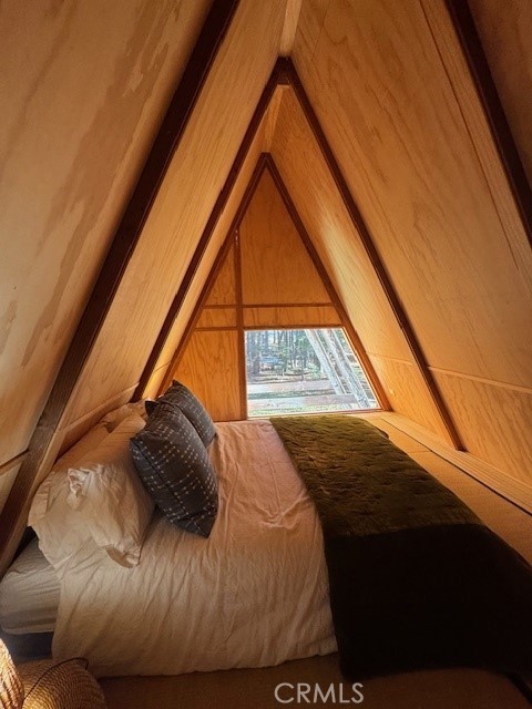 10-ac Beasore Road Bass Lake, CA 93604 - Photo 15 of 15 a bedroom with a bed and a window