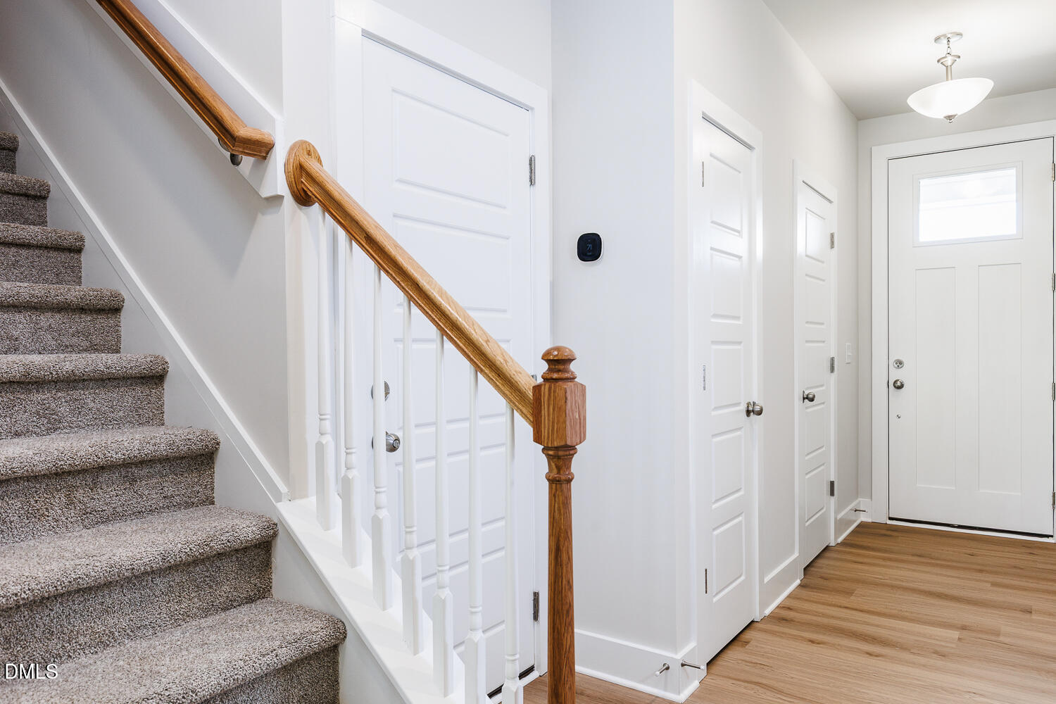 133 Silver Pne Drive Angier, NC 27501 - Photo 25 of 51 a view of staircase with white walls and railing