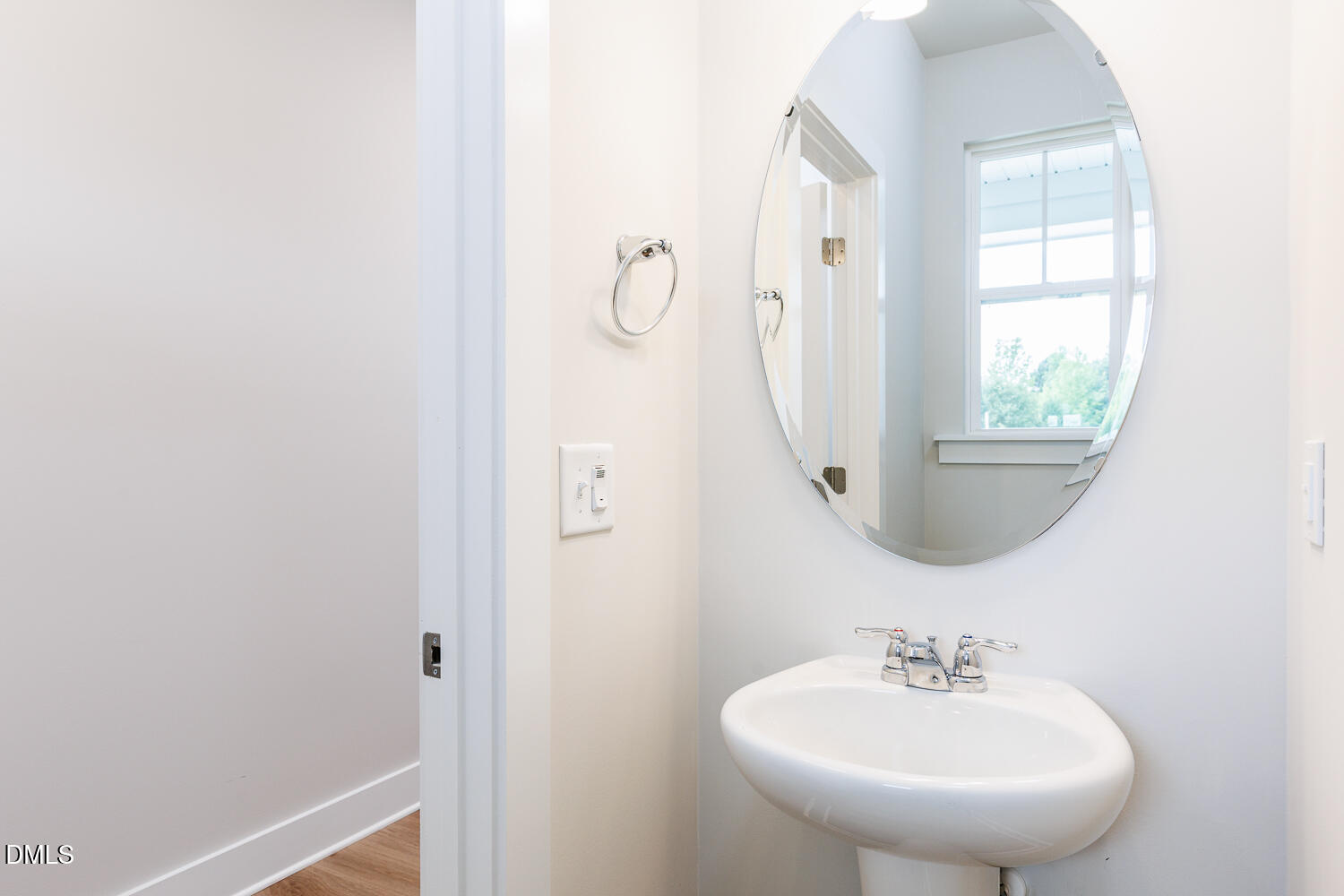 133 Silver Pne Drive Angier, NC 27501 - Photo 26 of 51 a bathroom with a sink a mirror and a window
