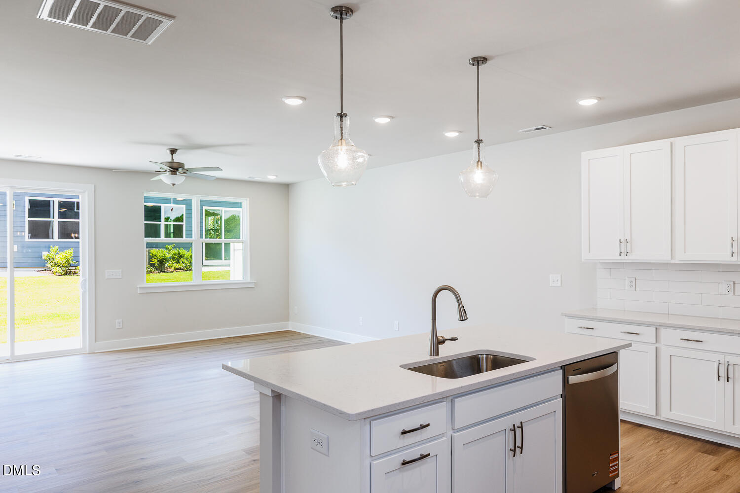 133 Silver Pne Drive Angier, NC 27501 - Photo 31 of 51 a kitchen with a sink window and cabinets