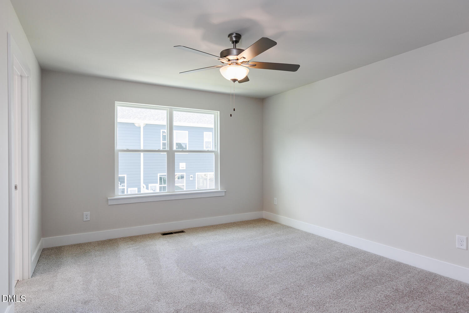 133 Silver Pne Drive Angier, NC 27501 - Photo 37 of 51 an empty room with chandelier fan and windows