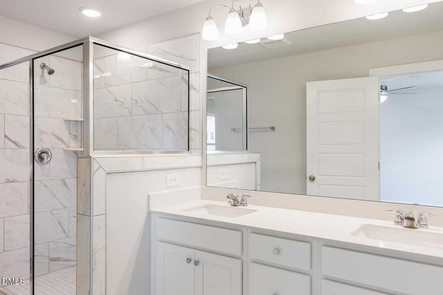 133 Silver Pne Drive Angier, NC 27501 - Photo 39 of 51 a bathroom with a shower sink and mirror