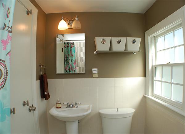 86 Arch Street Needham, MA 02492 - Photo 17 of 24 a bathroom with a sink and a mirror