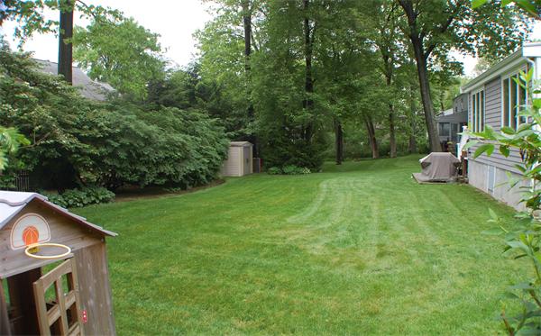 86 Arch Street Needham, MA 02492 - Photo 21 of 24 a backyard of a house with seating space