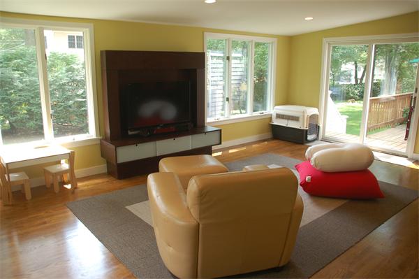 86 Arch Street Needham, MA 02492 - Photo 5 of 24 a living room with furniture window and flat screen tv