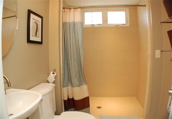 86 Arch Street Needham, MA 02492 - Photo 10 of 24 a bathroom with a sink and a toilet