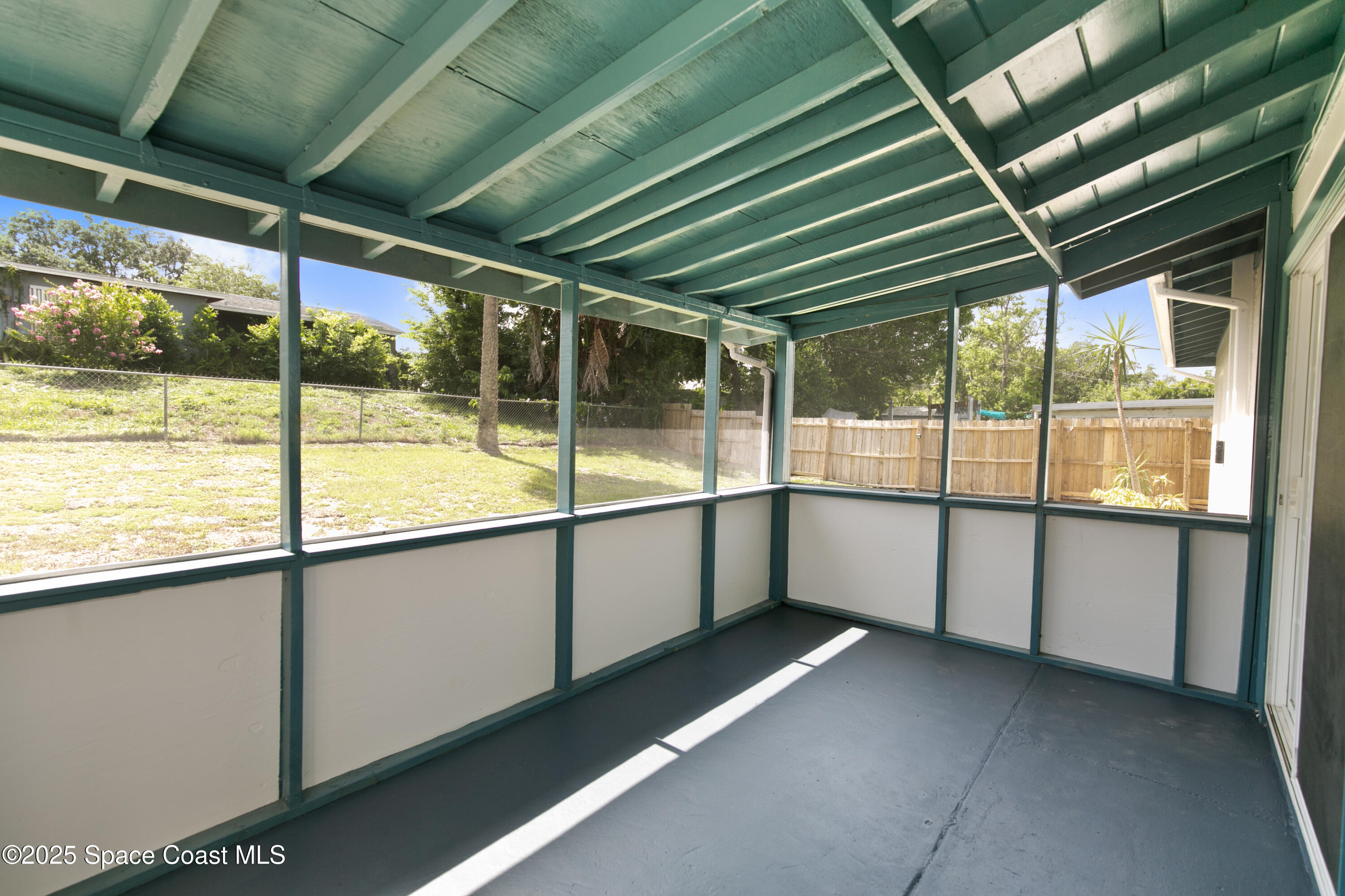 905 North Carpenter Road Titusville, FL 32796 - Photo 22 of 27 a view of a porch